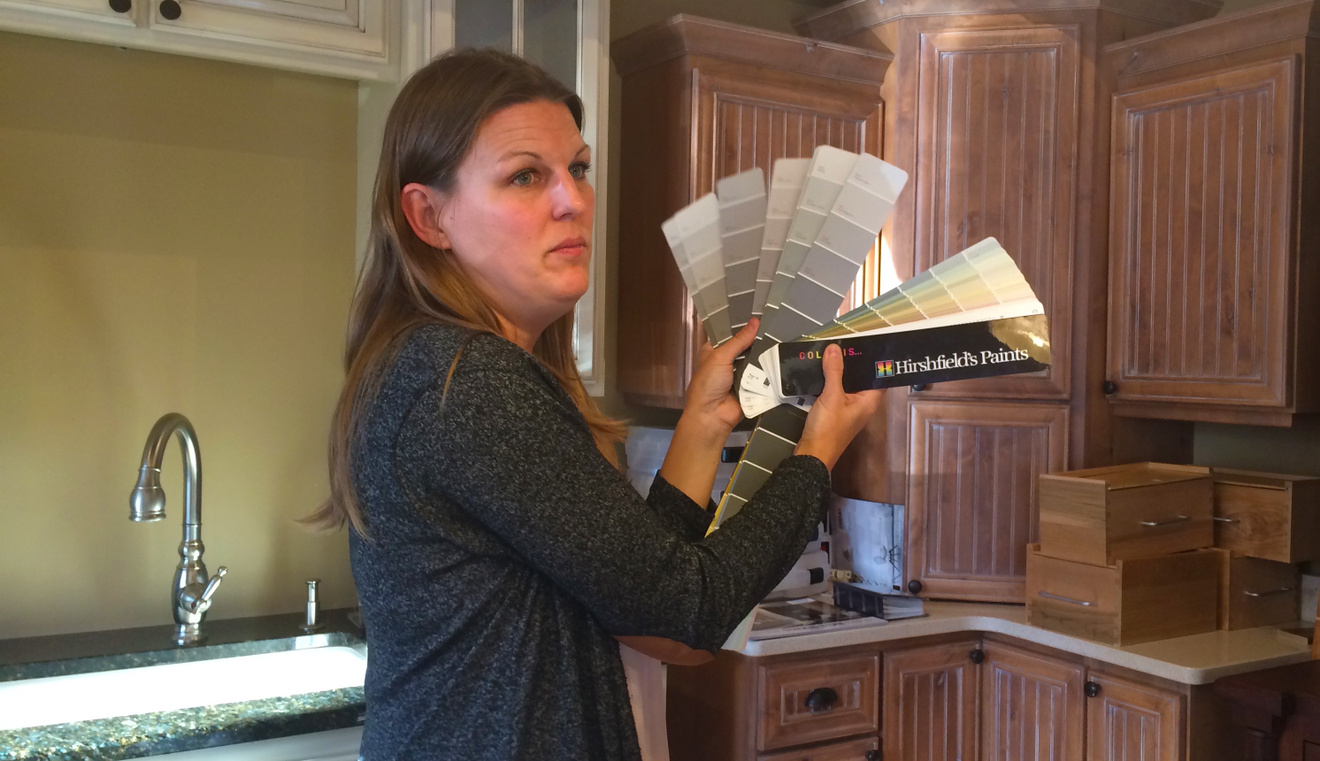 Shannon Scarrella presents "Paint Paralysis" to the staff at Murphy Bros.